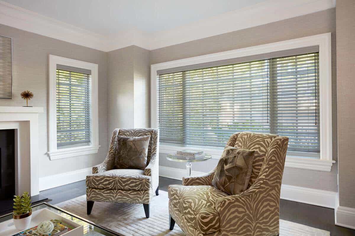 2 inches gray faux wood blinds, inside mounted with valence upgrade in a modern living room