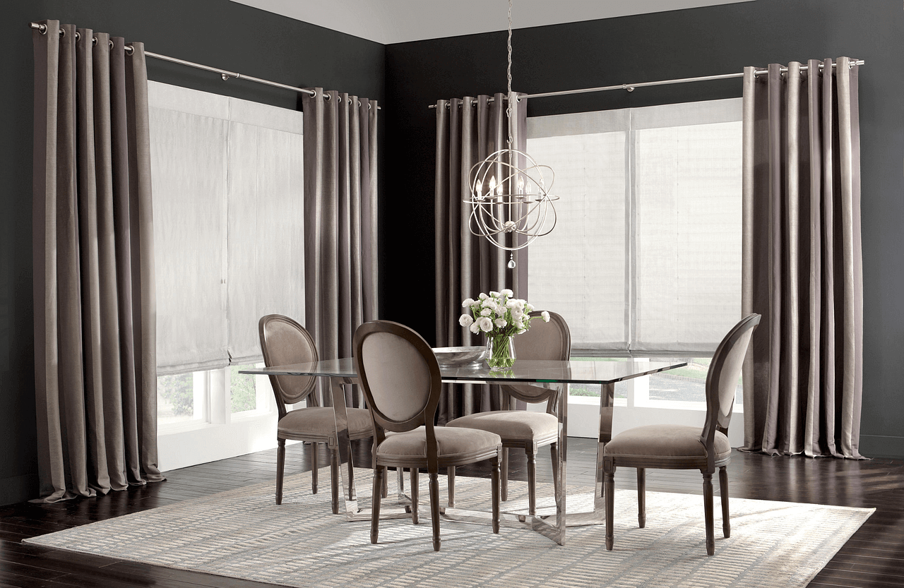 lighten up dark painted rooms with a lighter color draperies to add a nice contrast to your space
