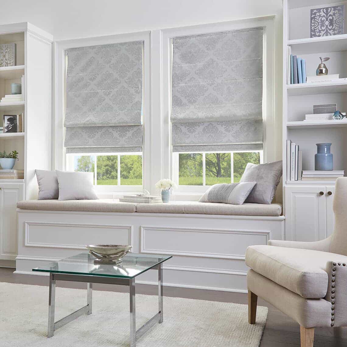 white roman shades in living room