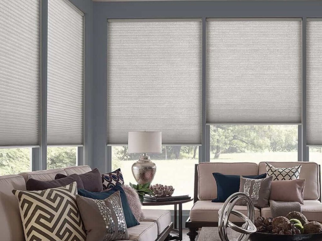 cellular shades installed in a stylish living room for enhanced insulation and privacy