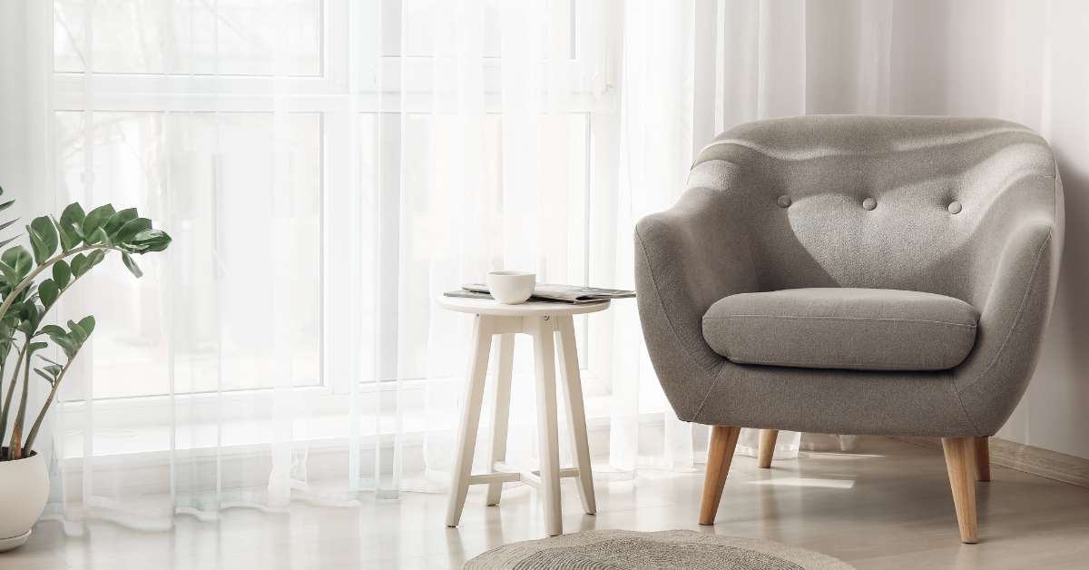 sheer drapes filtering natural light and adding elegance to a living room.